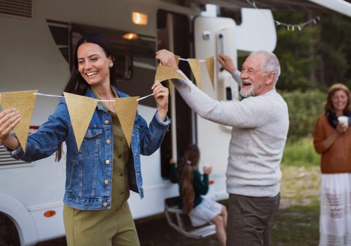 Family setting up camp site